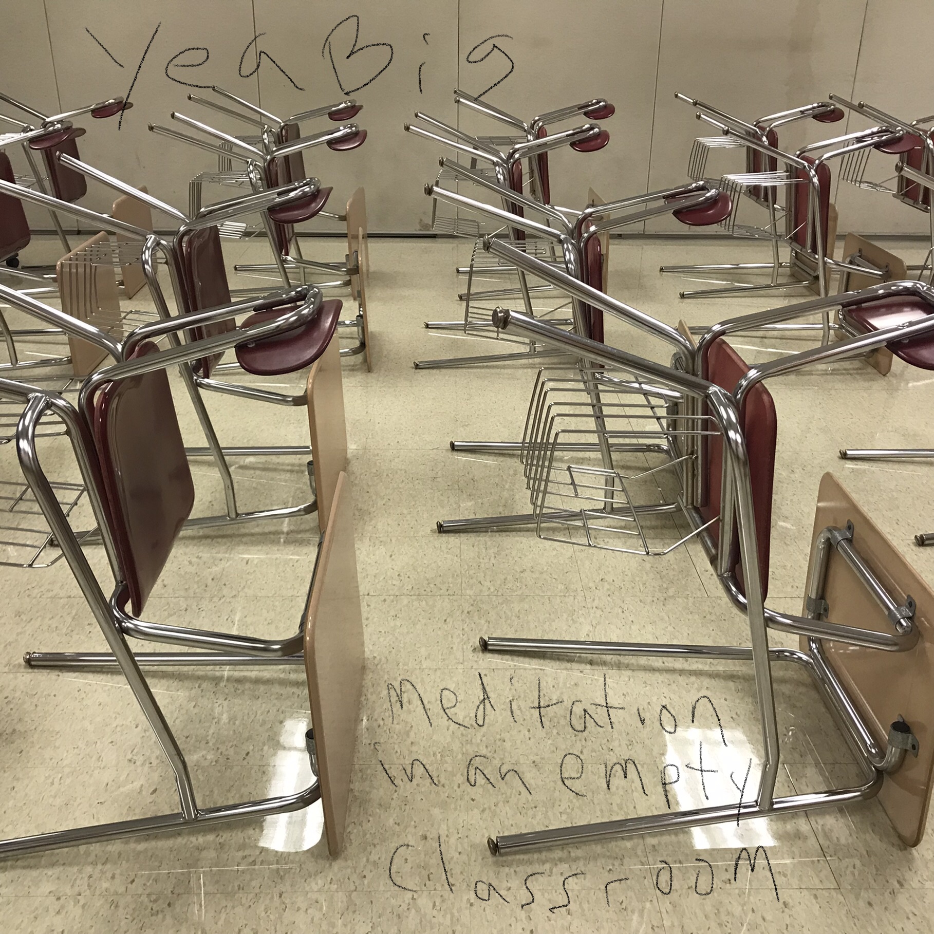 some chairs on their side in a classroom